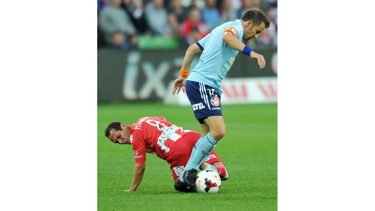 Alessandro Del Piero of Sydney controls the ball past Massimo Murdocca of the Heart during the round six A-League match between the Melbourne Heart and Sydney FC. Photo: Getty Images.