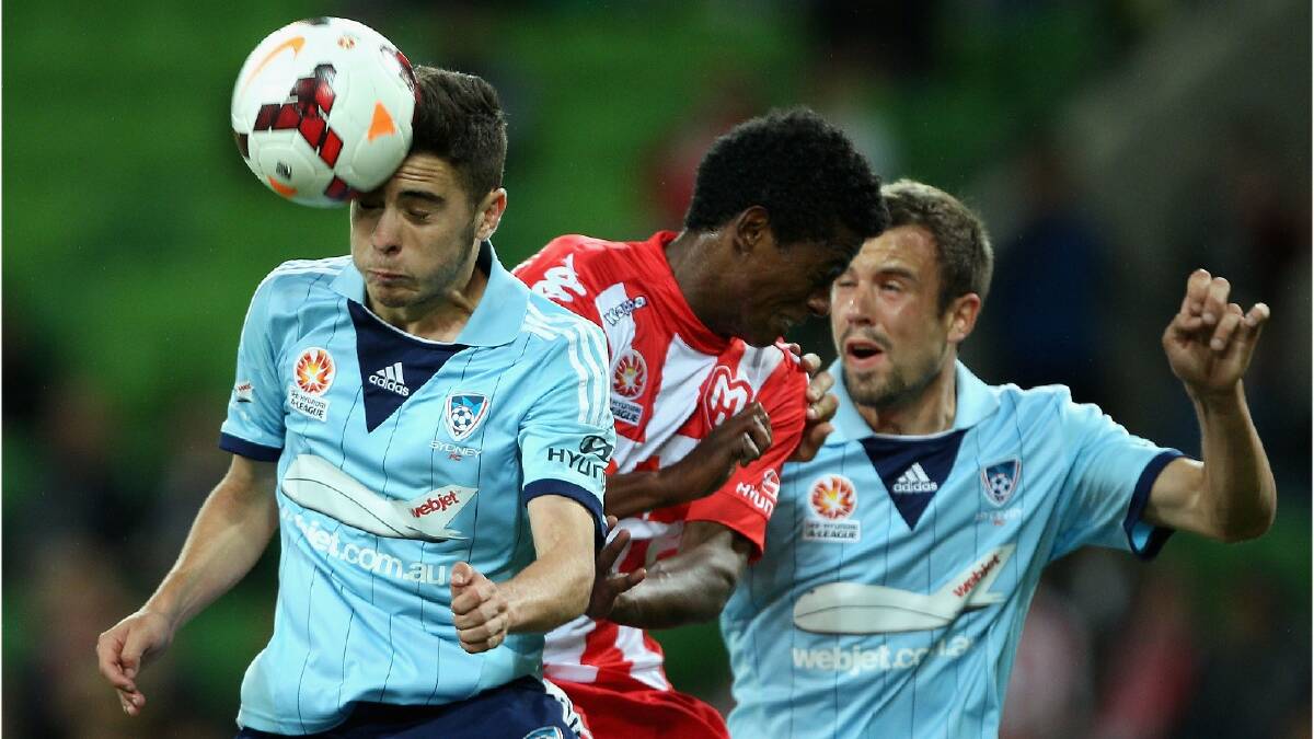 Chris Naumoff of Sydney heads the ball out of defence during the round six A-League match between the Melbourne Heart and Sydney FC. Photo: Getty Images.