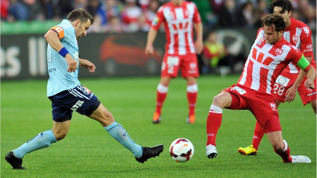 Alessandro Del Piero of Sydney and Robbie Wielaert of the Heart contest for the ball during the round six A-League match between the Melbourne Heart and Sydney FC. Photo: Getty Images.