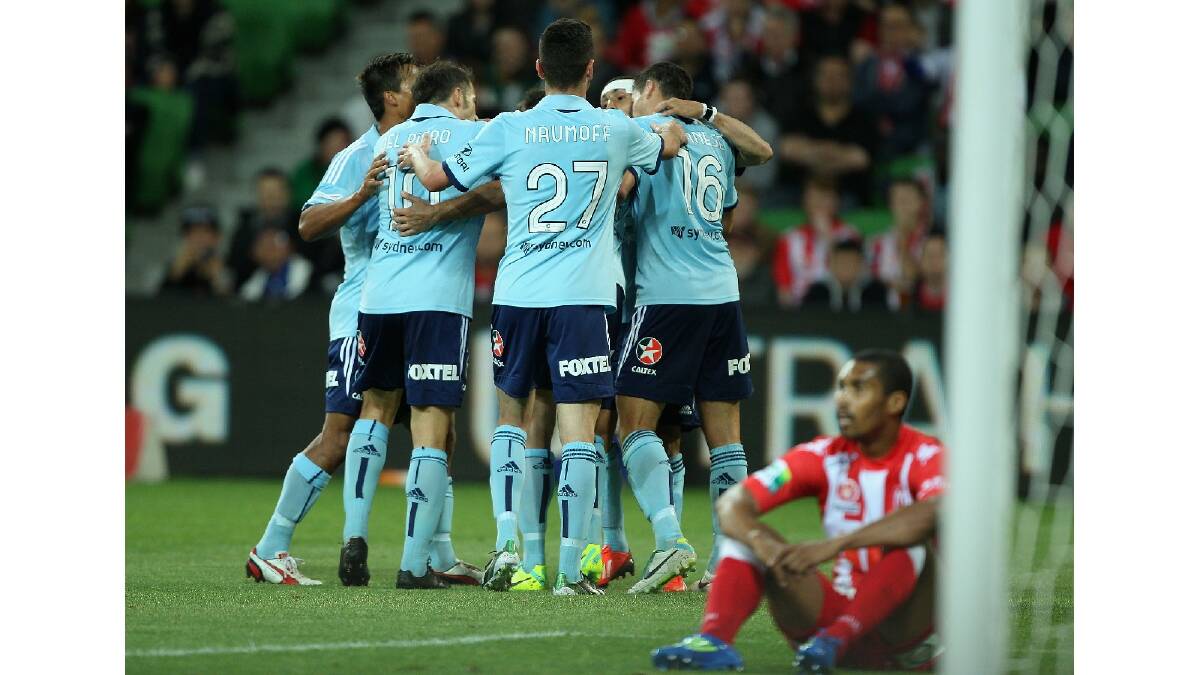 Joel Chianese of Sydney celebrates with team-mates after scoring a goal during the round six A-League match between the Melbourne Heart and Sydney FC. Photo: Getty Images.